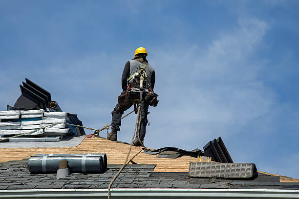 Professional Roof Replacement technician working in Grand Junction, MI